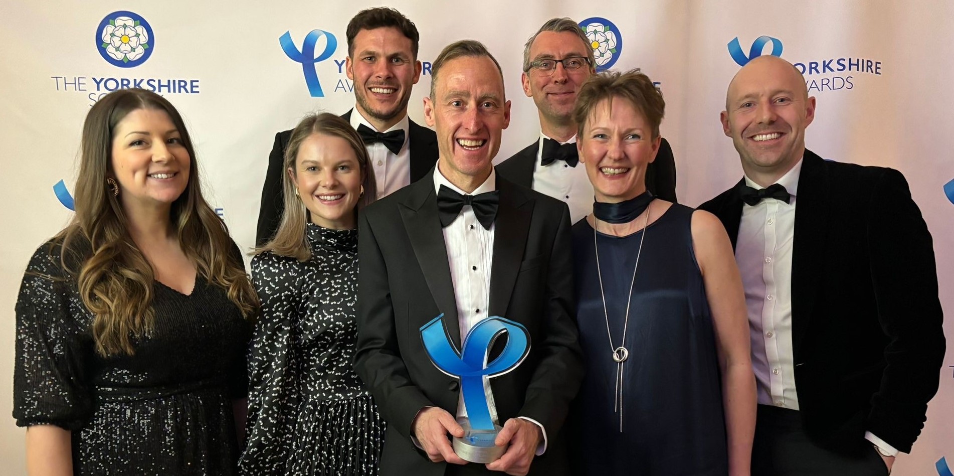 The Yorkshire Tea International team posing with their award,
