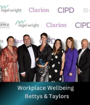 Wellbeing team accepting their award