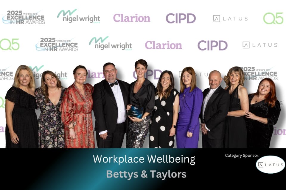 Wellbeing team accepting their award